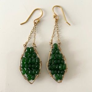 Green and gold drop earrings. Gold plated frame with green beads